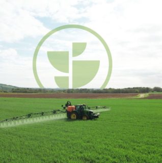 Tractor applying Elicit Plan'ts products